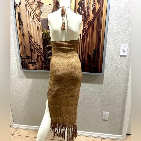 Tied Backless Split Thigh
Fringe Hem Halter Dress - Picture 11 of 11